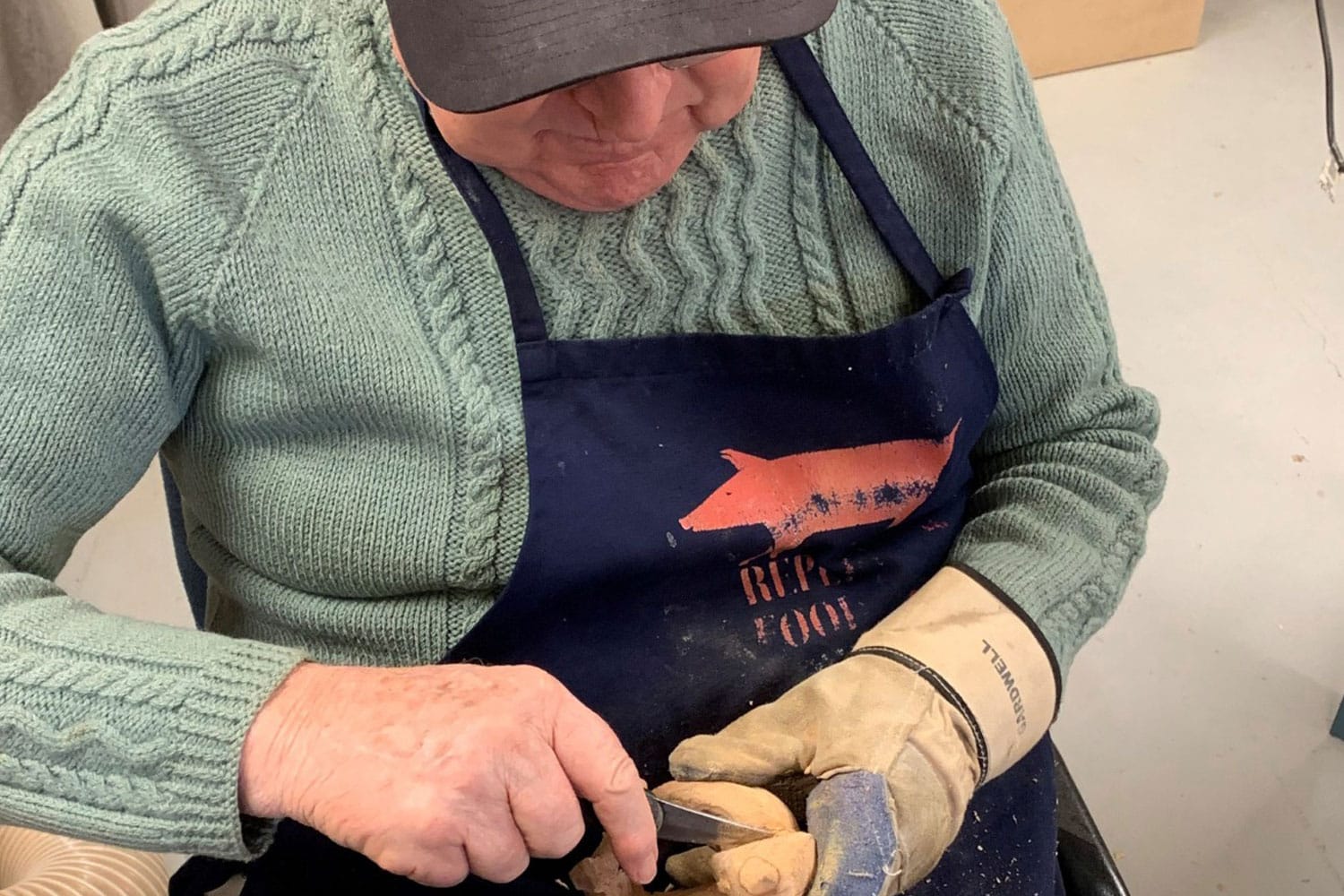 retirement village resident whittling